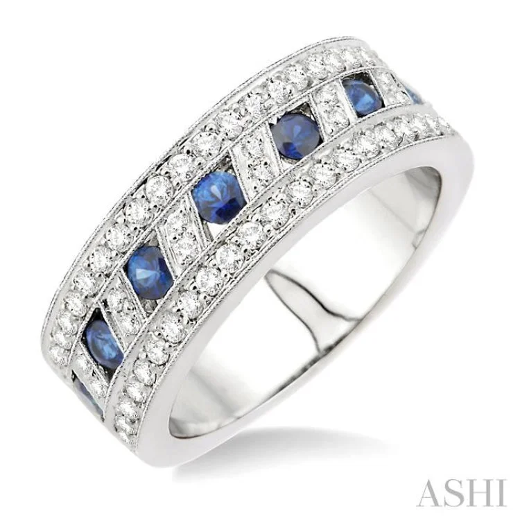 5/8 Ctw Round Cut Diamond and 2.6mm Round Cut Tanzanite Band in 18K White Gold